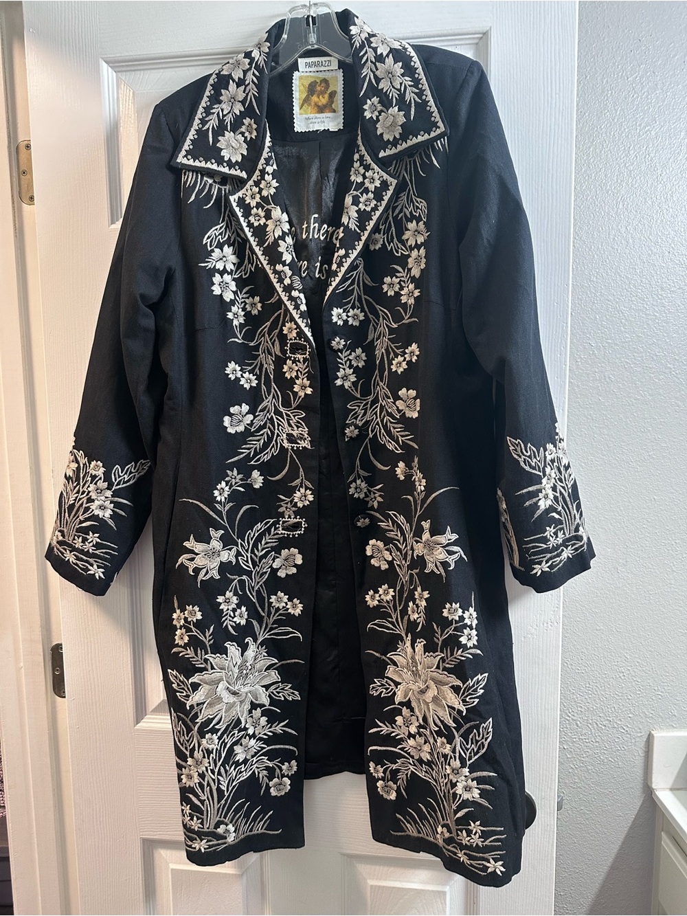 paparazzi Black Coat with White Floral Embroidery